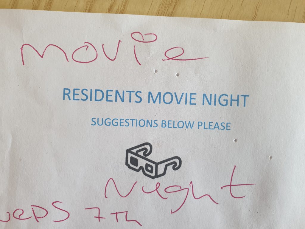 Sign for a resident-organised movie night to help them connect 